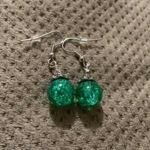 Green glass in silver and made balls